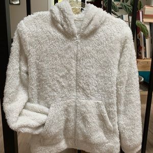Fluffy and soft and super warm! Worn fewer than 5 times.